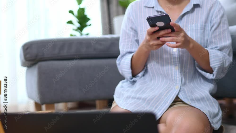 Close up business woman checking product to send to customer for the online order Close up business woman checking product to send to customer for the online order