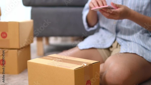 Close up business woman preparing product to send to customer for the online order