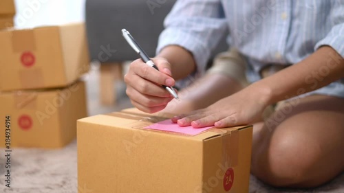 Close up business woman preparing product to send to customer for the online order