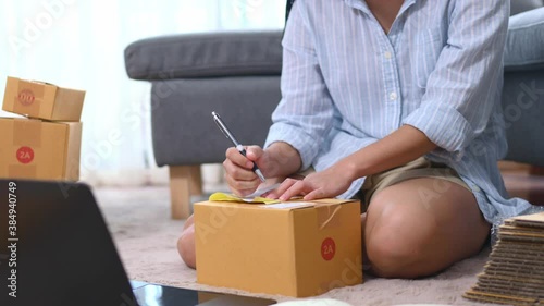 Close up business woman preparing product to send to customer for the online order