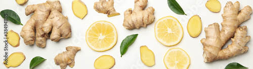 Tableau sur toile Fresh ginger and lemon on white background, top view