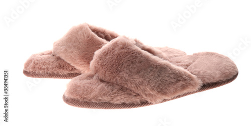 Pair of stylish soft slippers on white background