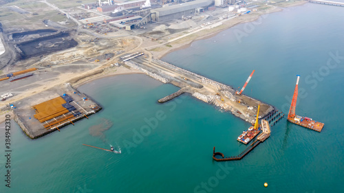 Aeriel view of the under construction new pier and harbor.