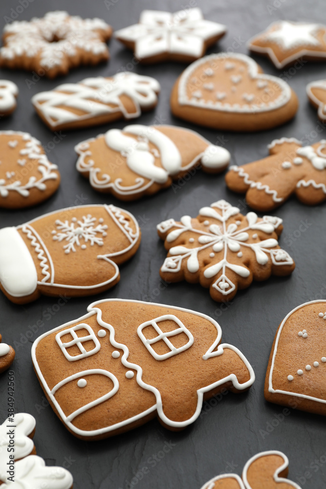 Many different delicious Christmas cookies on black table Many different delicious Christmas cookies on black table