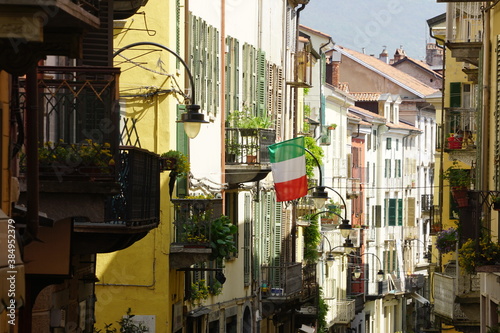 Fototapeta Naklejka Na Ścianę i Meble -  Italian flag and balconies in Ivrea