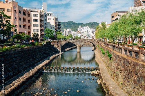 Megane-bashi spectacles bridge with city view in Nagasaki, Japan photo
