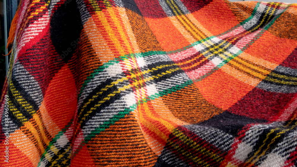 Spread out wool blanket in bright colors