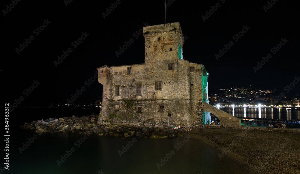 The ancient castle on the sea by night, Rapallo, Ligurian riviera, Genoa province, Italy