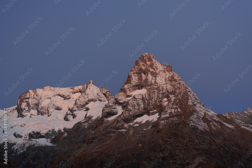 top of Belalakaya mountain in Dombai in the early morning before sunrise, background image