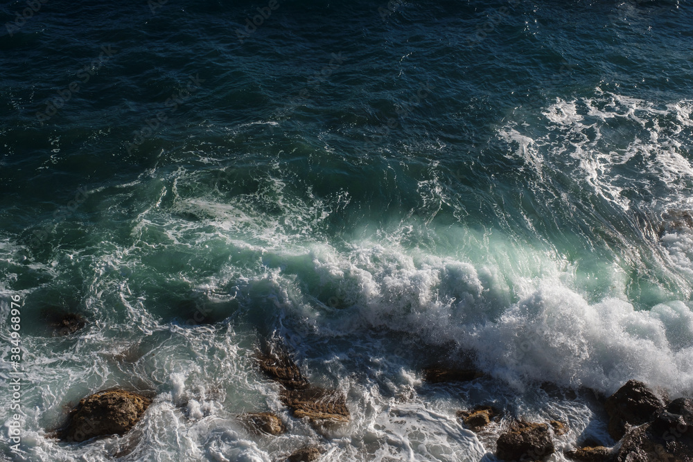 Ocean wave background breaking sea water rocky shore Ocean wave background breaking sea water rocky shore