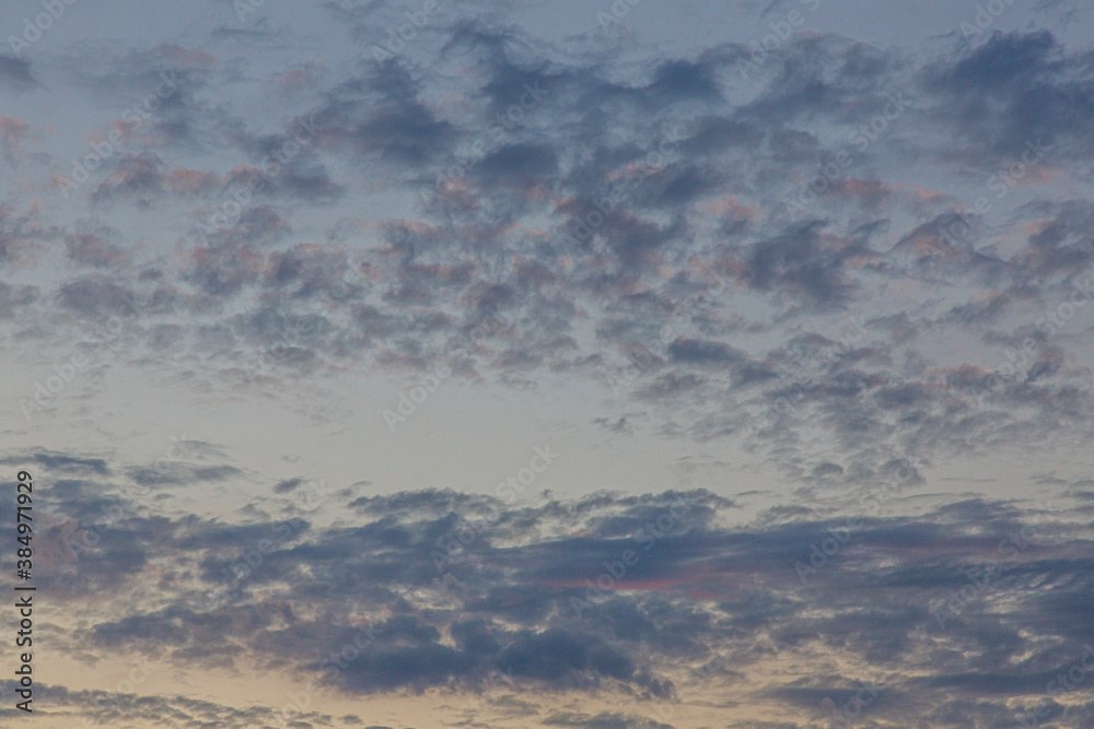 Dramatic colorful sky with afterglow and illuminated clouds Dramatic colorful sky with afterglow and illuminated clouds
