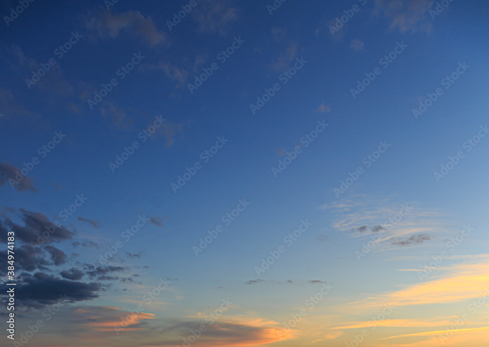 Dramatic colorful sky with afterglow and illuminated clouds Dramatic colorful sky with afterglow and illuminated clouds