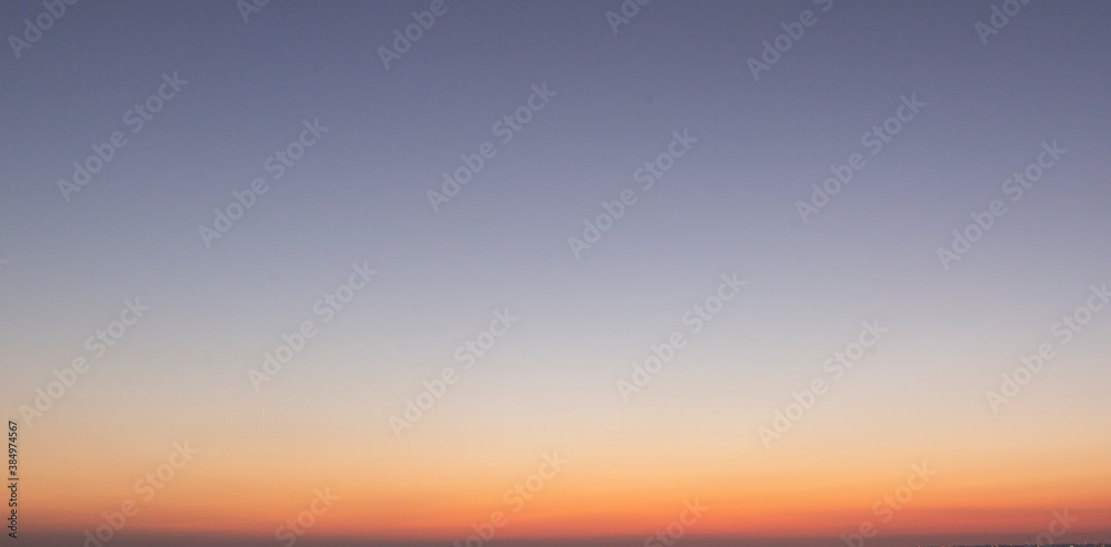 Dramatic colorful sky with afterglow and illuminated clouds Dramatic colorful sky with afterglow and illuminated clouds