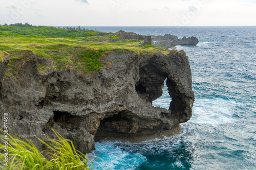  Cape Manzamo is a scenic rock formation on Okinawa Island, Japan. photo