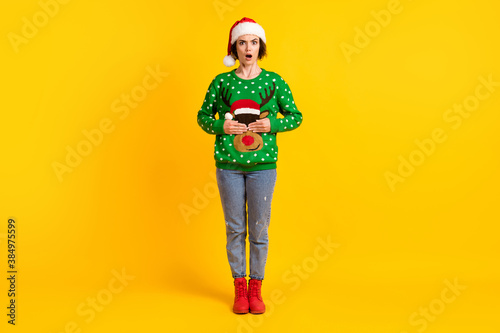 Full size photo astonished frustrated girl in santa claus headwear dislike theme x-mas christmas party cancelled close cover hands deer decor pullover eyes isolated shine color background