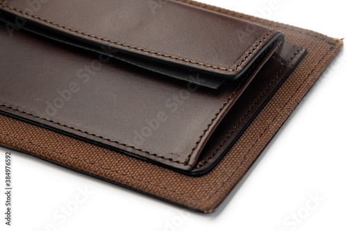 Brown shiny wallet isolated on white background