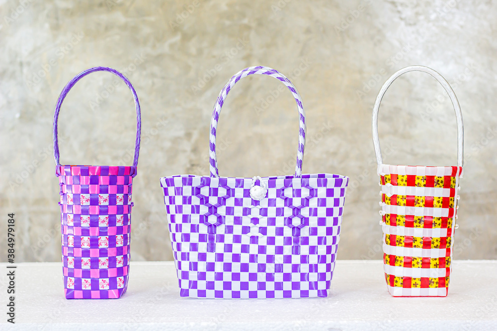 Plastic weave basket handmade on white background in Thailand Plastic weave basket handmade on white background in Thailand
