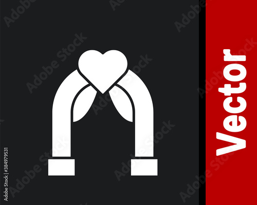 White Wedding arch icon isolated on black background. Wedding decoration. Vector.