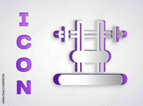 Paper cut Bench with barbel icon isolated on grey background. Gym equipment. Bodybuilding, powerlifting, fitness concept. Paper art style. Vector.
