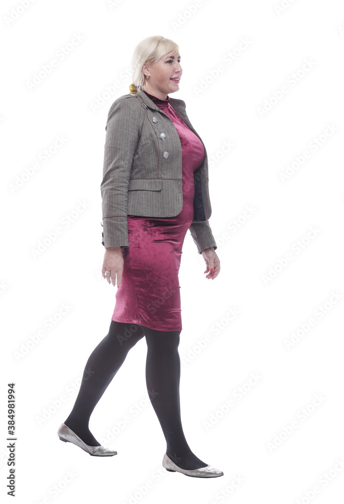full- length . attractive young woman striding forward full- length . attractive young woman striding forward