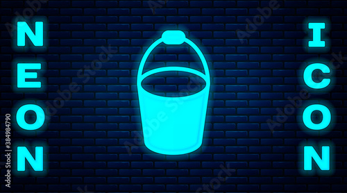 Glowing neon Fire bucket icon isolated on brick wall background. Metal bucket empty or with water for fire fighting. Vector.