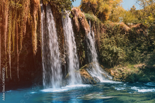 The upper Dyuden waterfall is a unique natural wonder not far from the center of Antalya. Golden soft light in early autumn in Turkey