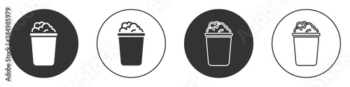 Black Bucket with soap suds icon isolated on white background. Bowl with water. Washing clothes, cleaning equipment. Circle button. Vector.