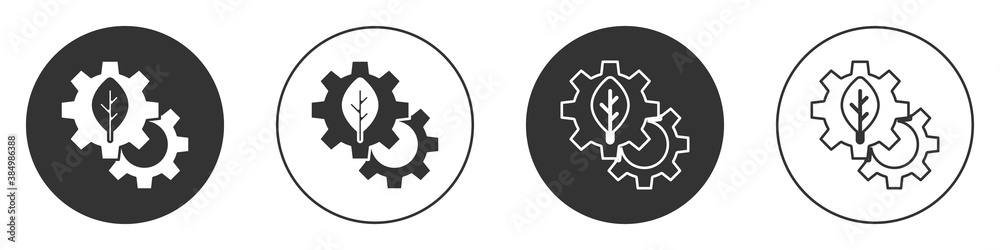 Black Leaf plant ecology in gear machine icon isolated on white background. Eco friendly technology. World Environment day label. Circle button. Vector. Black Leaf plant ecology in gear machine icon isolated on white background. Eco friendly technology. World Environment day label. Circle button. Vector.