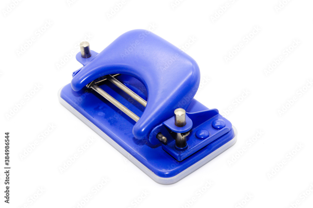 A picture of paper punching machine on white background A picture of paper punching machine on white background