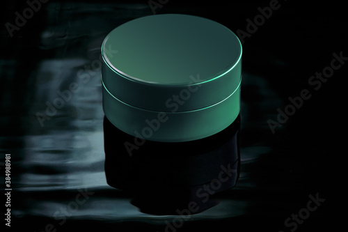 Mockup for advertising cream, lation, moisturizing milk or body and face care products. Small jar of emerald color photo