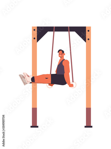 sportsman doing abs exercises man exercising on horizontal bar working out in gym fitness training healthy lifestyle concept full length vertical vector illustration