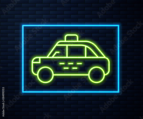 Glowing neon line Taxi car icon isolated on brick wall background. Vector.