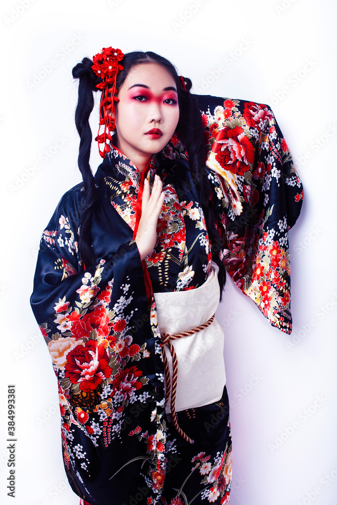 young pretty geisha in black kimono with sakura, asian ethno closeup on white background isolated young pretty geisha in black kimono with sakura, asian ethno closeup on white background isolated