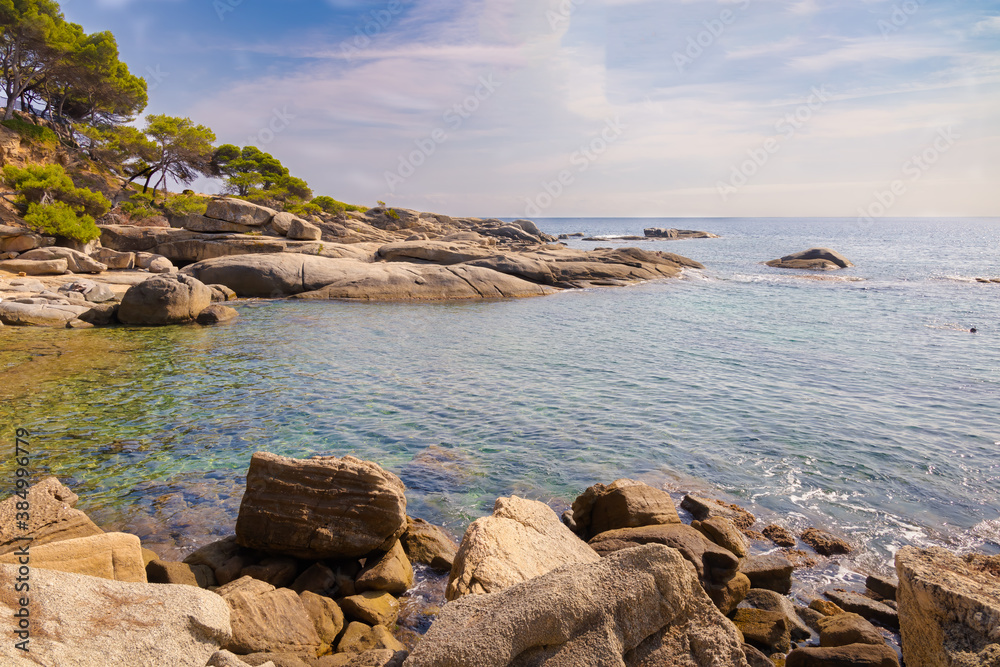 Coastal path of Sant. Antoni de Calonge to Aro beach - Panoramic view of the tip of Roques Planes from the tip of the bay. Costa Brava, Catalonia, Spain