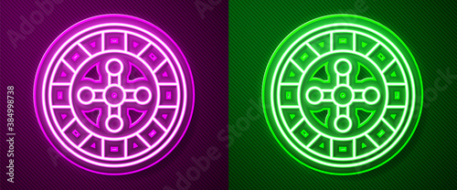 Glowing neon line Casino roulette wheel icon isolated on purple and green background. Vector.