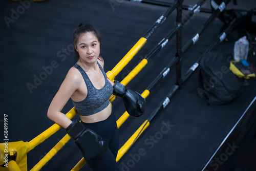 boxer woman exercising in gym