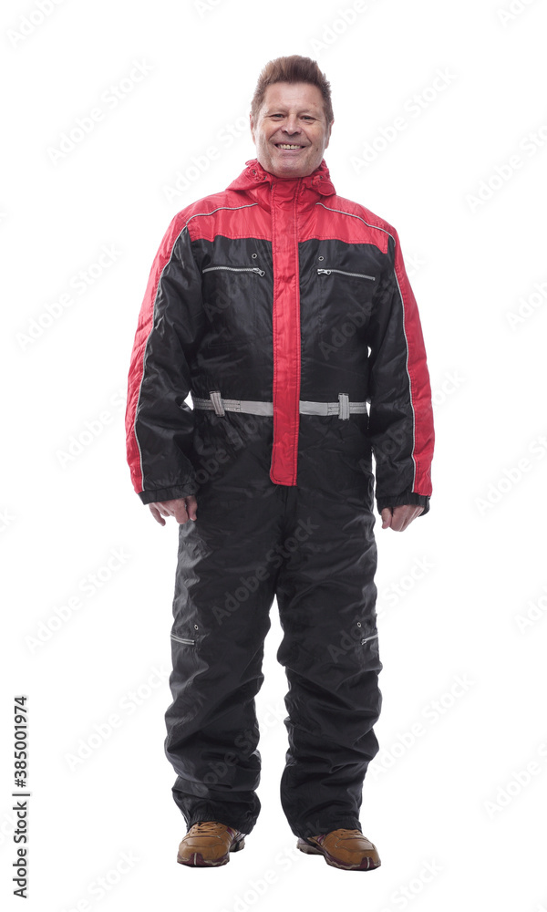 attractive man in a winter insulated jumpsuit attractive man in a winter insulated jumpsuit
