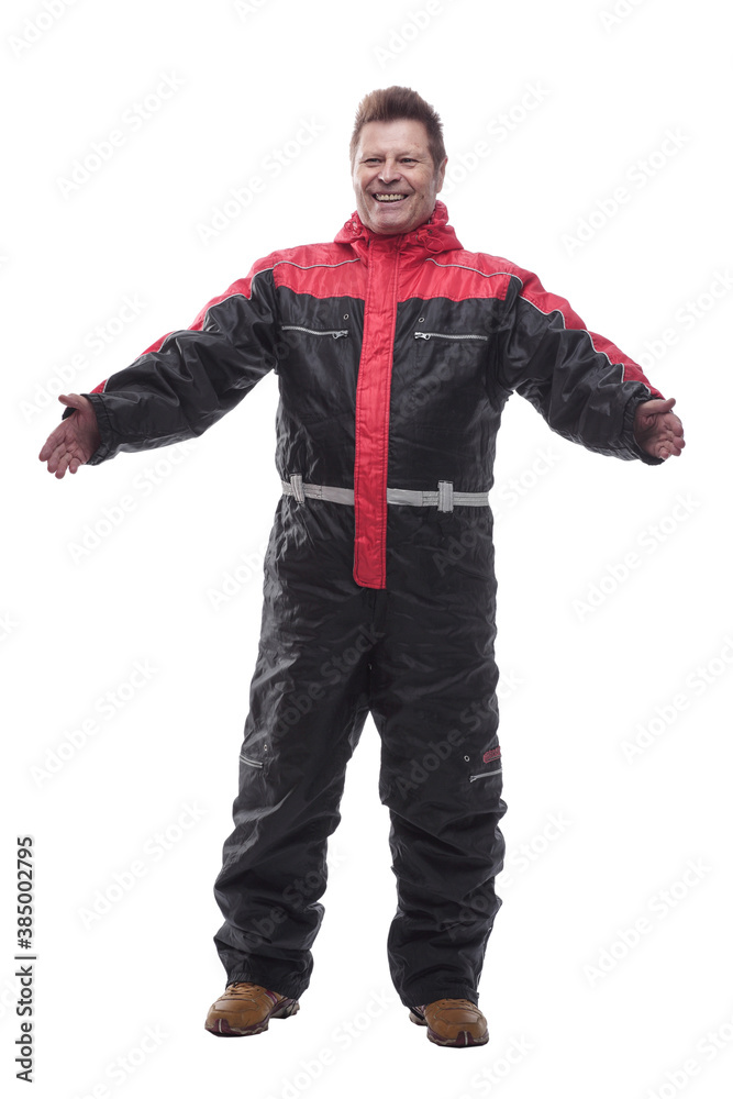 man in a winter insulated jumpsuit reading walking forward man in a winter insulated jumpsuit reading walking forward