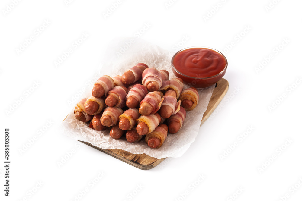 Obraz premium Pig in blankets. Sausages wrapped in smoked bacon isolated on white background