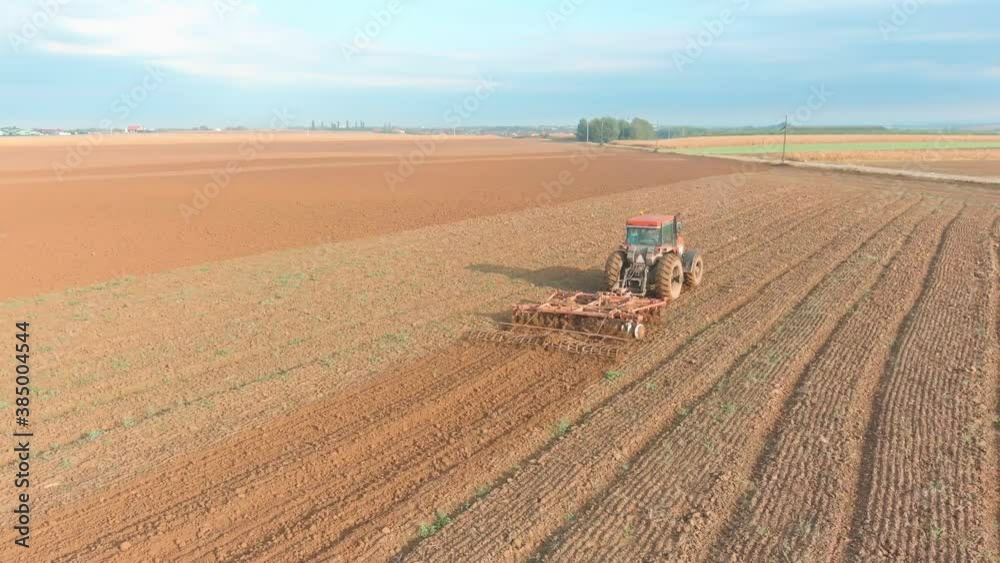 Tractor on field Aerial Drone
Tractor on field Aerial Drone