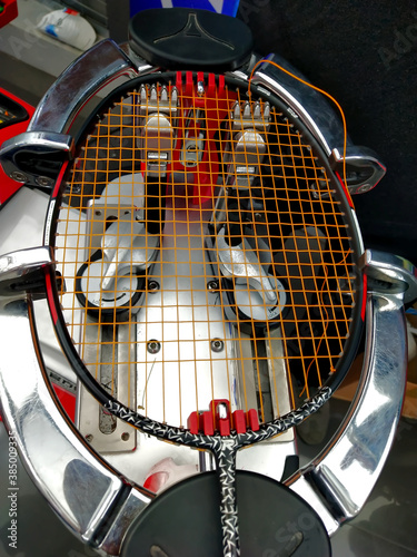 Top view of Stringing badminton racket on the racquet weaving machine