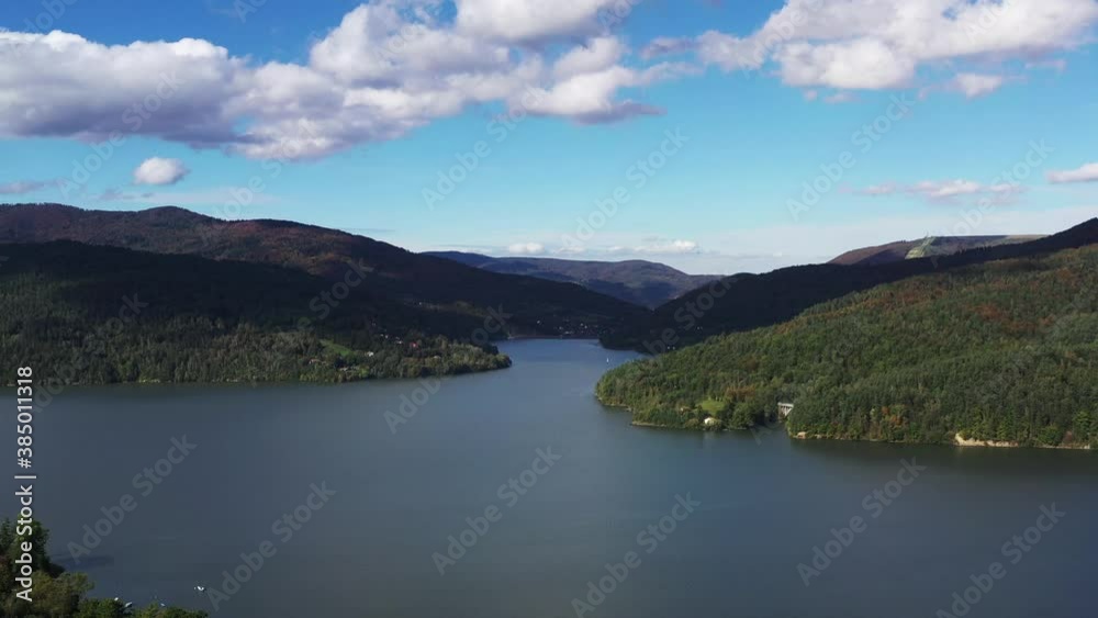 Żywieckie Lake - a mountain lake in the city of Żywiec - beautiful landscape aerial shot Żywieckie Lake - a mountain lake in the city of Żywiec - beautiful landscape aerial shot