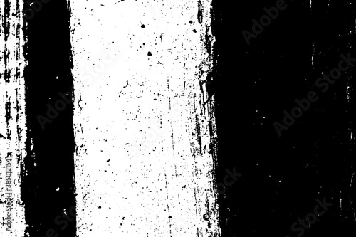 Black and white grunge texture. Black streaks of paint, ink, and dirt. Abstract monochrome background. Pattern of scratches, chips, and wear