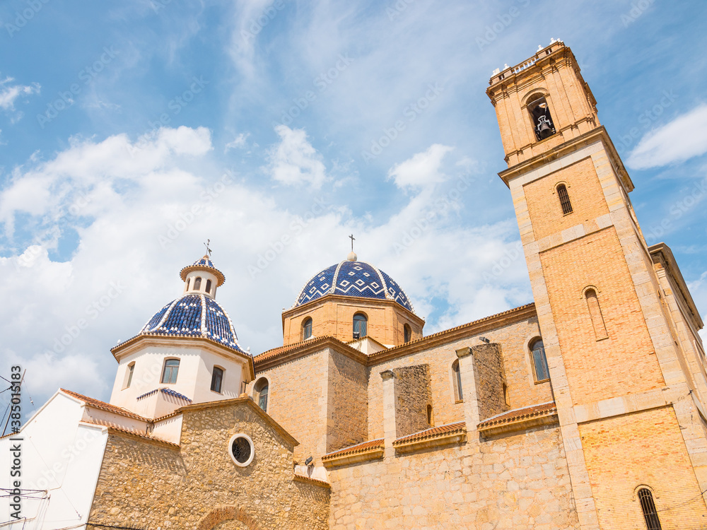 Beautiful low angle shot of the Church of Our Lady of Consolation of Altea (Nuestra Señora del Consuelo Church). Also called the dome of the mediterranean. Beautiful low angle shot of the Church of Our Lady of Consolation of Altea (Nuestra Señora del Consuelo Church). Also called the dome of the mediterranean.