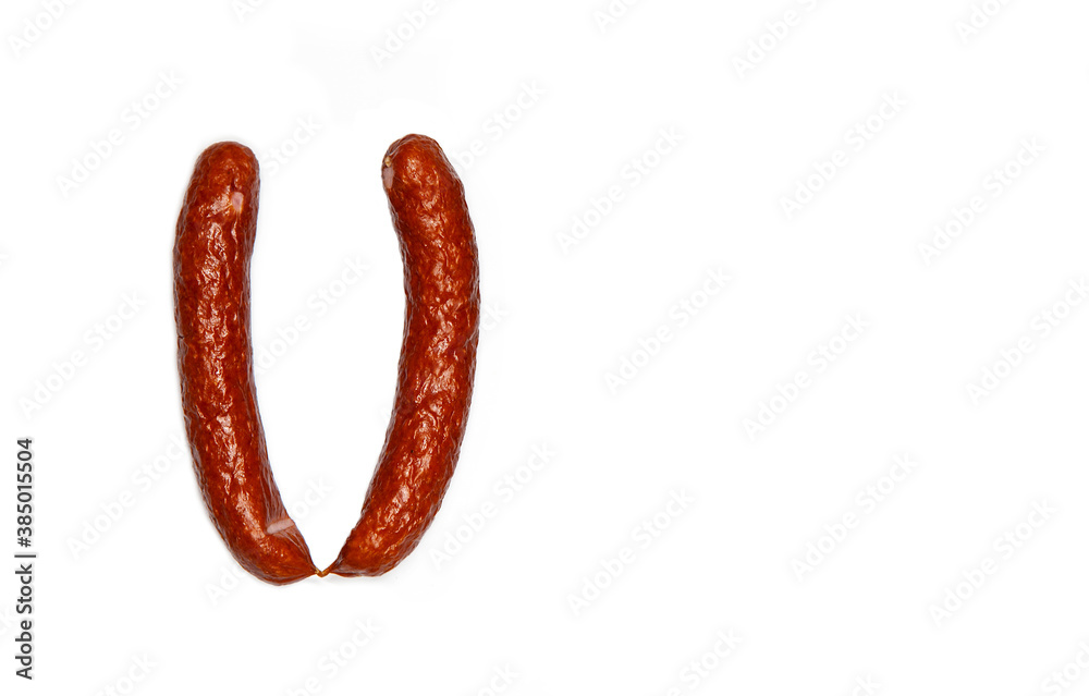 Creative layout of pinkel, a smoked kaszanka sausage, Cabanossi isolated on white background. Food concept. Flat lay and copy space for text Creative layout of pinkel, a smoked kaszanka sausage, Cabanossi isolated on white background. Food concept. Flat lay and copy space for text