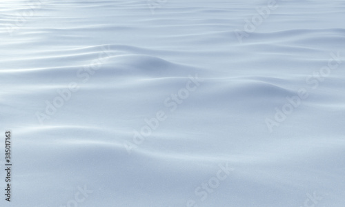 White snow field with bumps and waves blue background