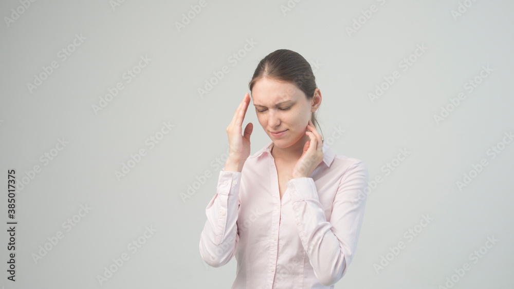 Young beautiful woman has headache Young beautiful woman has headache