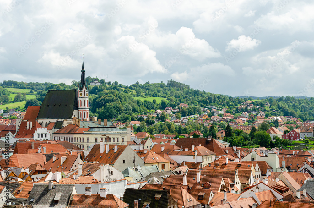 Φωτογραφία Horizontal Rooftop view of Cesky Krumlov and high St Vitus church, famous touristic old town in Czech Republic in summer