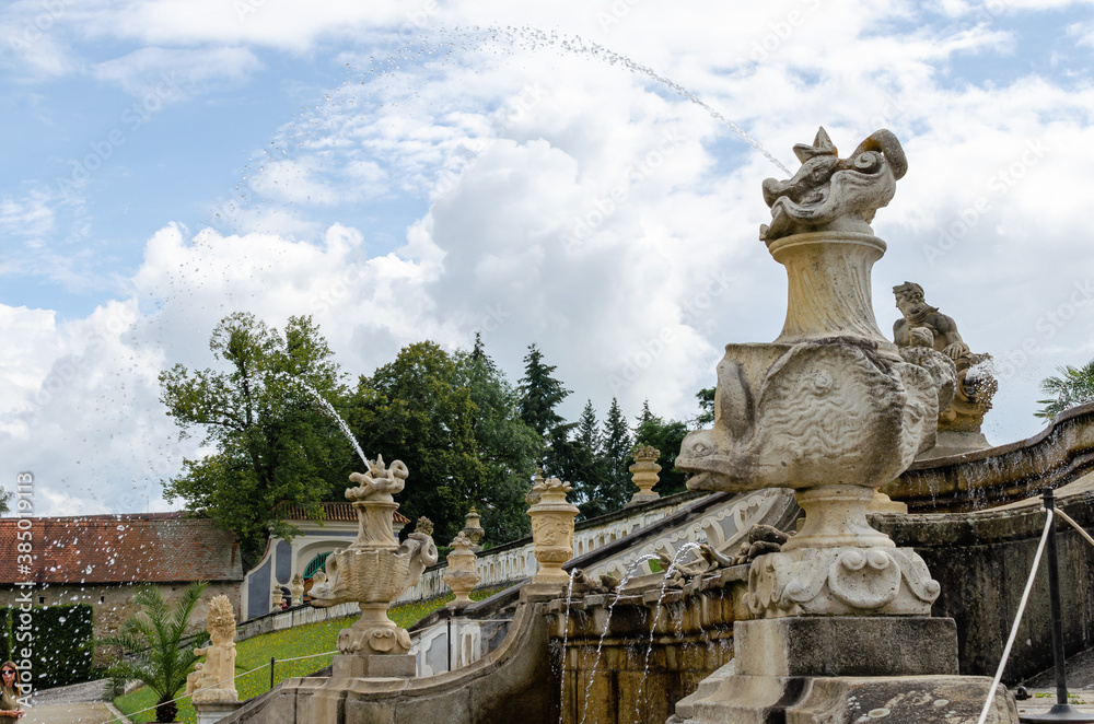 View of decorated fountain in baroque Castle Gardens of Cesky Krumlov, Czech Republic.