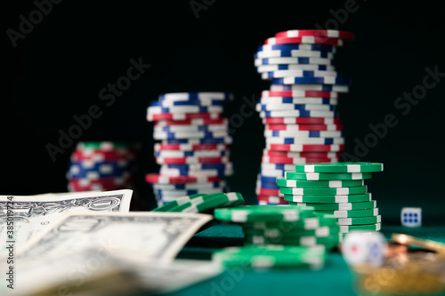 Poker game online with dollars on a table